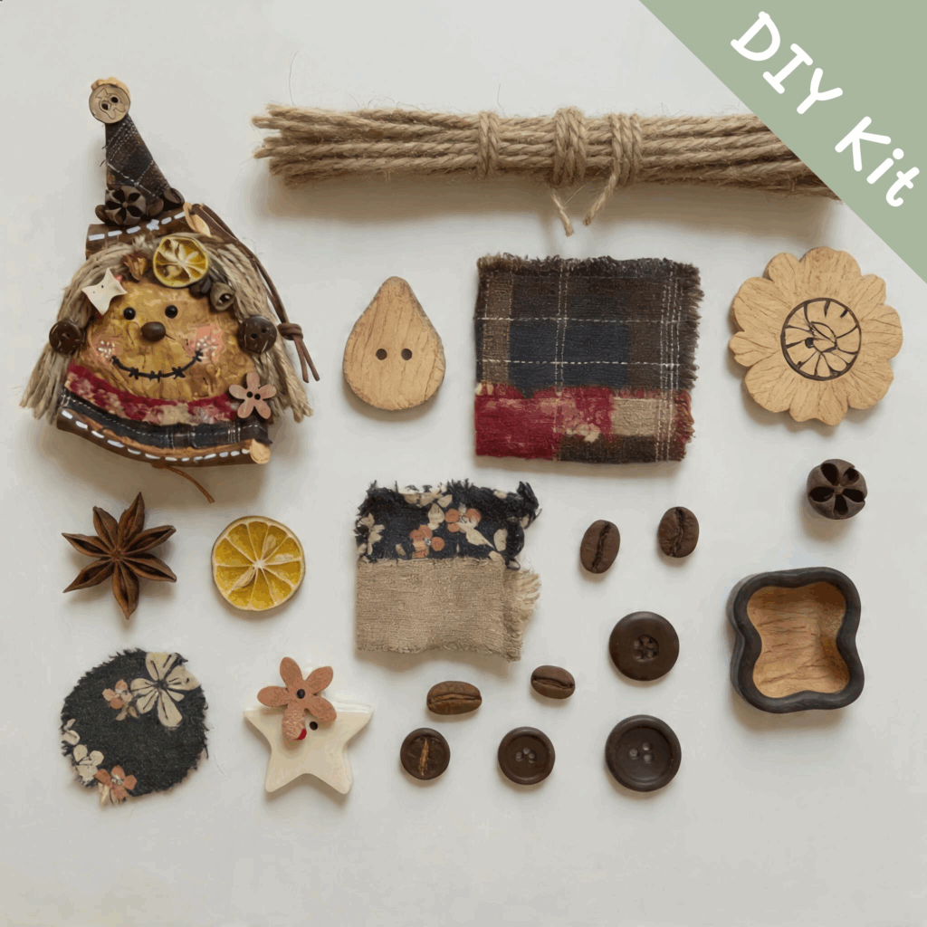 DIY kit materials for rustic witch pod doll with fabric, rope, buttons, dried citrus, and decorative pieces