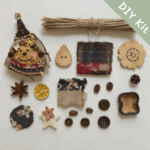 DIY kit materials for rustic witch pod doll with fabric, rope, buttons, dried citrus, and decorative pieces