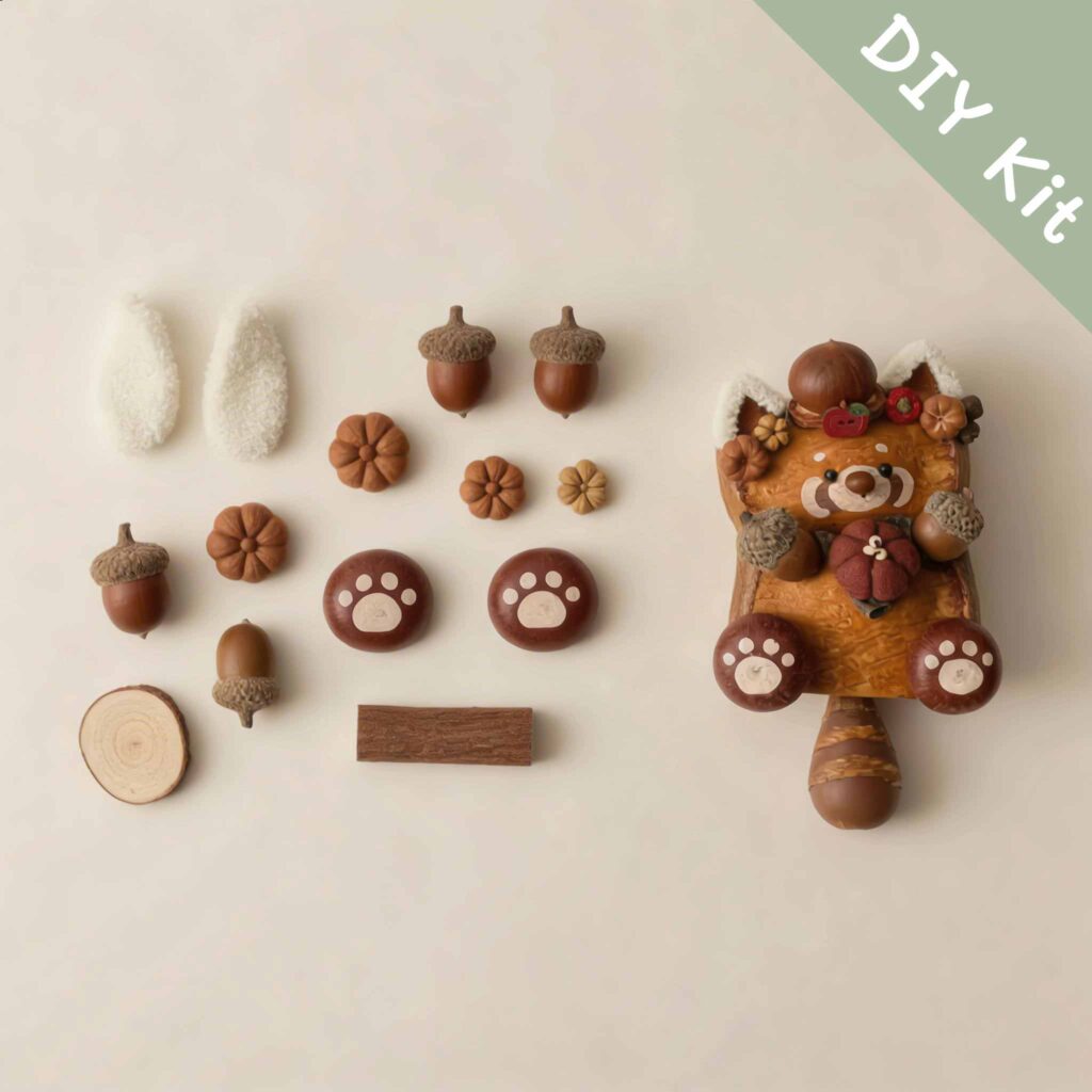 DIY kit materials for Swing-Tail Cat Pod Doll Autumn Acorn Kitty arranged beside the finished design on a neutral background