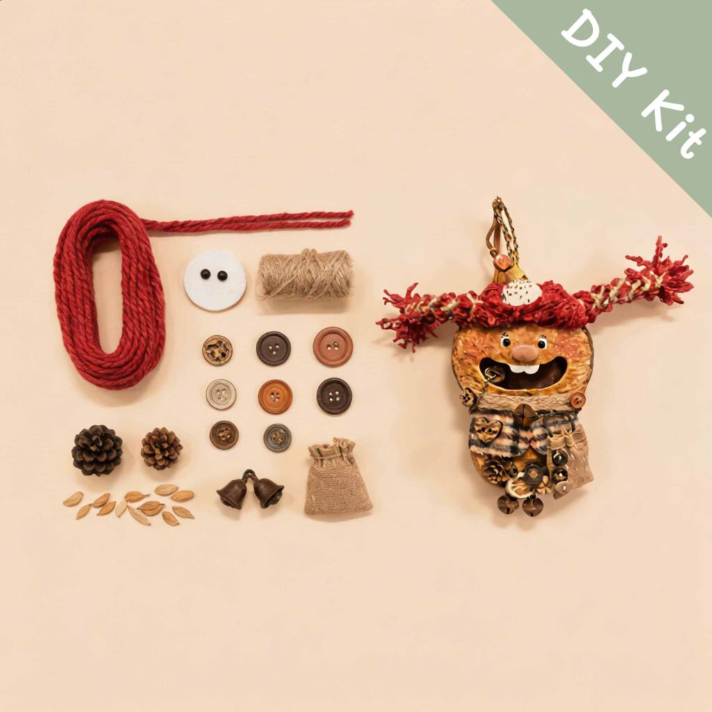 DIY kit materials for Open-Mouth Pod Doll Scarlet Twiglet arranged beside the finished design on a neutral background