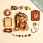 Happy Pocket Bear pod doll DIY kit with storybook cap, textured pocket, teddy bear patch, and natural craft accessories