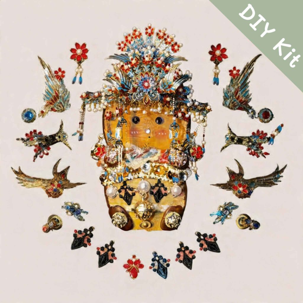 Flat lay of a handmade ornate pod doll surrounded by red-and-blue floral ornaments, bird motifs, and jewelry-inspired decorative pieces