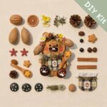 Flat lay of a DIY kit for a handmade open-mouth bunny baker pod doll with natural materials and miniature baking accessories
