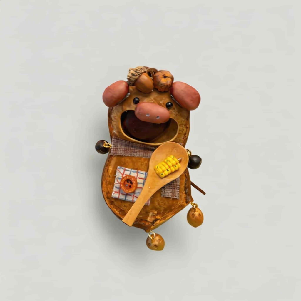 Open-Mouth Pod Doll Corn Spoon Piglet with pink snout, tiny ears, and miniature wooden spoon with corn detail on a neutral background