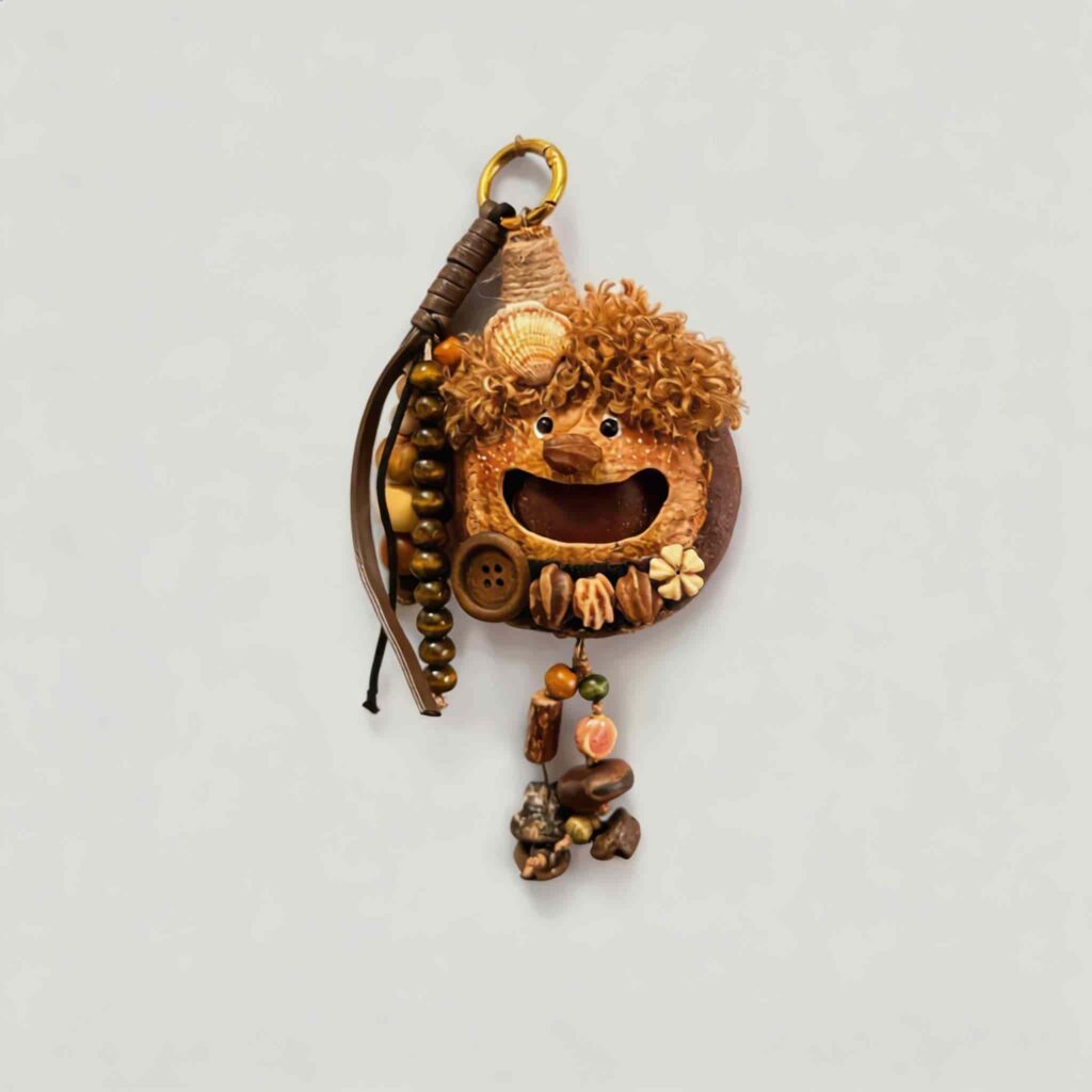Open-Mouth Pod Doll Walnut Shell Sprite with fluffy walnut-brown curls, shell accent, and dangling woodland charm cluster on a neutral background