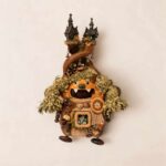 Double-Sided Pod Doll Mossy Witch Cottage Twin with tall cottage tower hat and mossy green pigtails on a neutral background