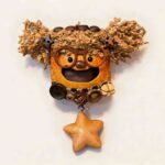 Open-Mouth Pod Doll Starry Pigtail Girl with fluffy pigtails, round glasses, and dangling star charm on a neutral background