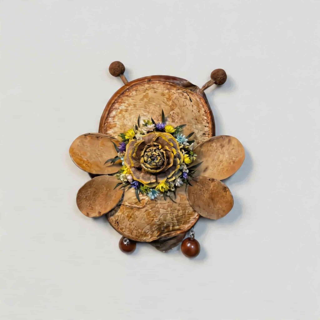 Reverse view of Blossom Bee Fairy pod doll with layered petal design and dimensional floral centerpiece