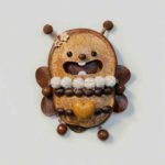 Double-Sided Open-Mouth Pod Doll Blossom Bee Fairy with bee-inspired front and floral decorative back on a neutral background
