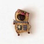 Chestnut Pocket Pig Pod Doll with pink piggy details, patchwork-style pockets, and chestnut centerpiece on a neutral background