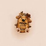 Handmade Woodland Puppy Decor with floppy ears, plaid bow tie, paw-print feet, and woodland details on a neutral background