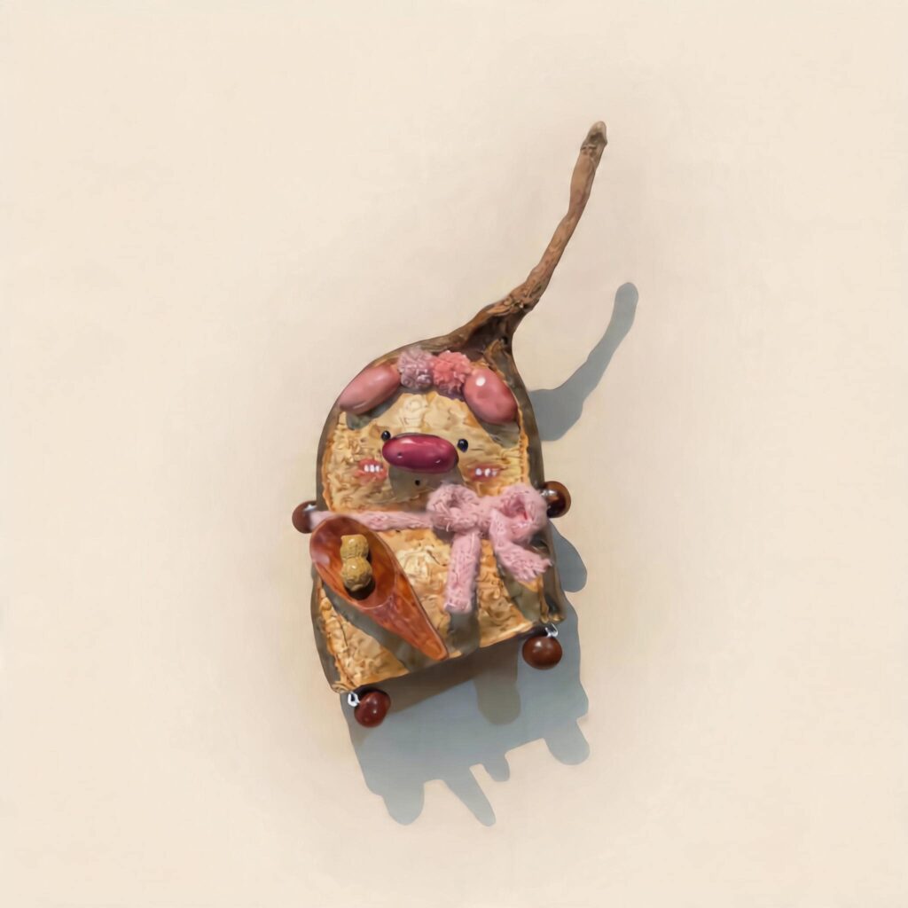 Handmade Whimsical Piglet Bell Decor with pink piggy details, knitted bow, spoon accents, and woodland styling on a neutral background