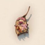 Handmade Whimsical Piglet Bell Decor with pink piggy details, knitted bow, spoon accents, and woodland styling on a neutral background