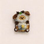 Handmade Clover Star Lamb pod doll with fluffy white wool texture, seed pod ears, pinecone accents, and yellow star centerpiece