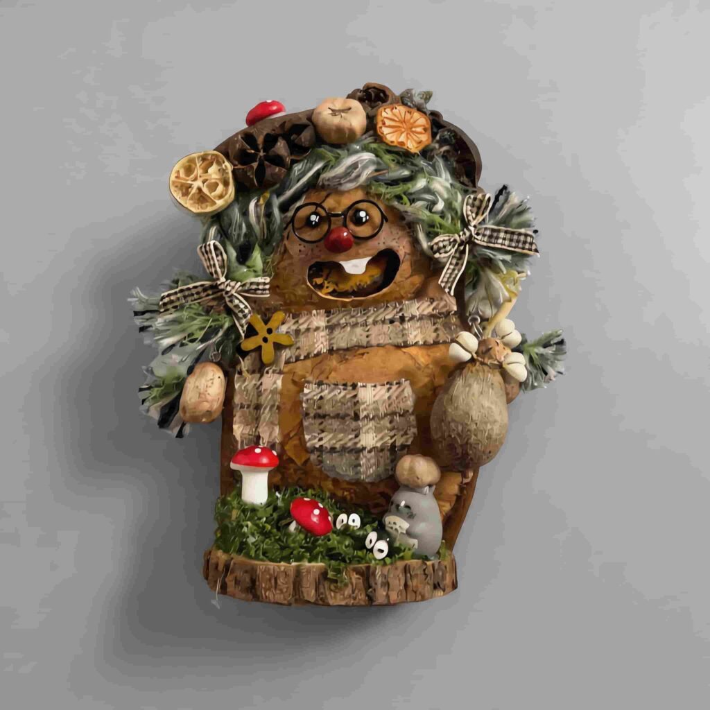 Front view of Mossy Mushroom Granny pod doll with patchwork scarf, tiny pouch, mushrooms, moss, and forest base decor