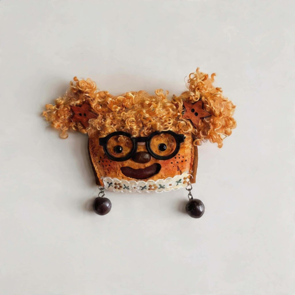 Front view of a small handmade pod doll with warm toast colors, lace trim, and dangling bead details