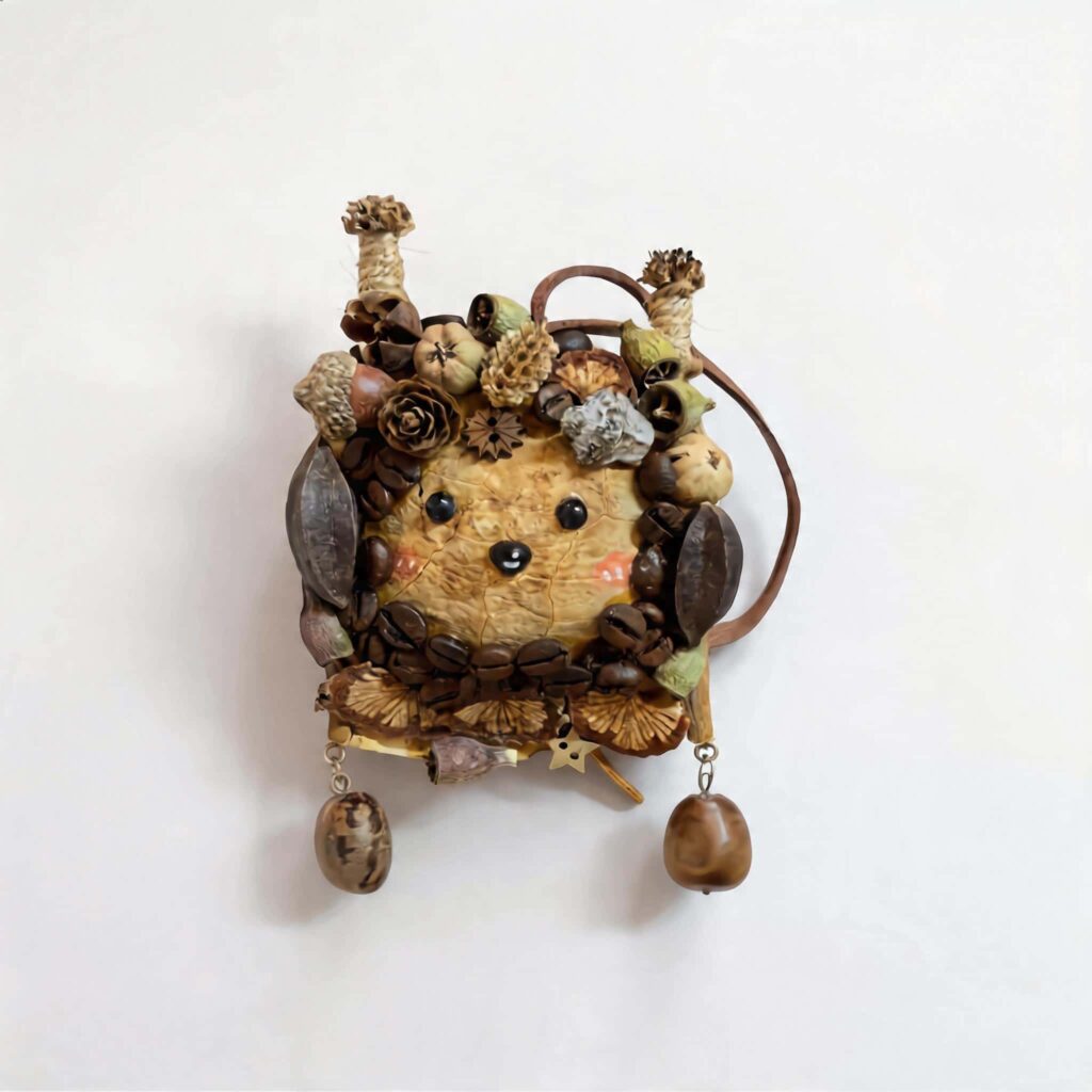 Front view of finished Coffee Grove Sprite pod doll on a plain background with coffee bean trim and natural rustic embellishments.