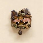Open-Mouth Pod Doll Woodland Fox front view with pointed ears, pinecone crown, rosy whisker cheeks, and open-mouth expression