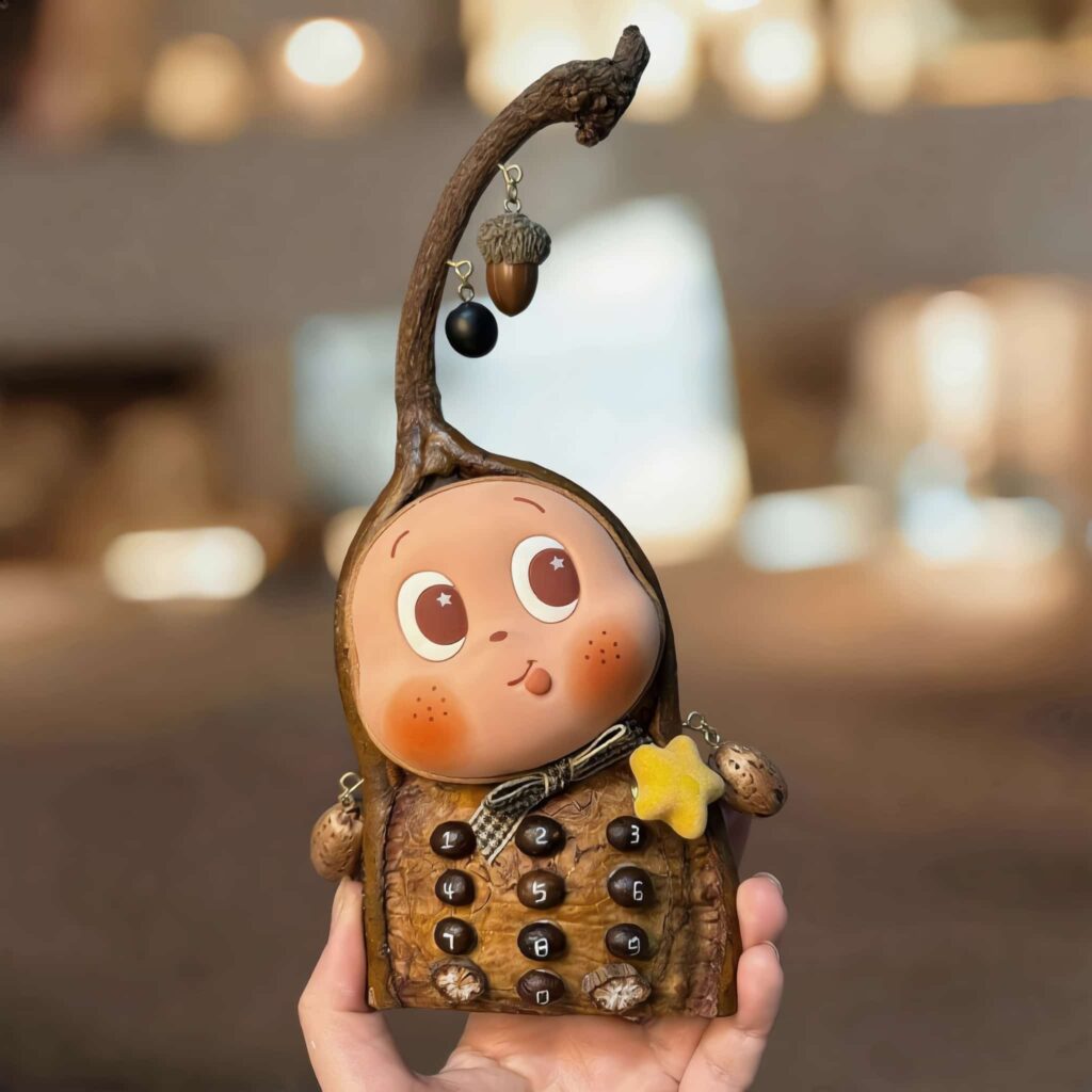 Acorn Phone Pod Doll finished doll lifestyle view with woodland hanging design and button keypad details