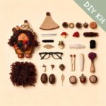 Autumn Witch Pod Doll Bramble Scholar DIY kit flat lay with pod base hat glasses curly hair material and autumn craft supplies