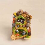 DIY kit materials for Tartan Bear Cub pod doll arranged on a neutral background