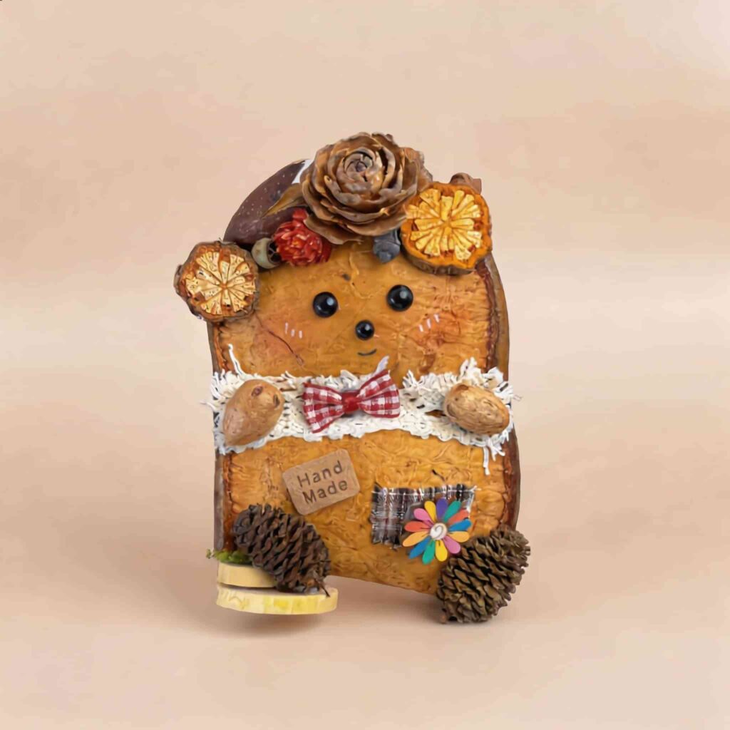 Back view of Tartan Bear Cub pod doll with tartan bow, handmade tag, and rustic woodland details