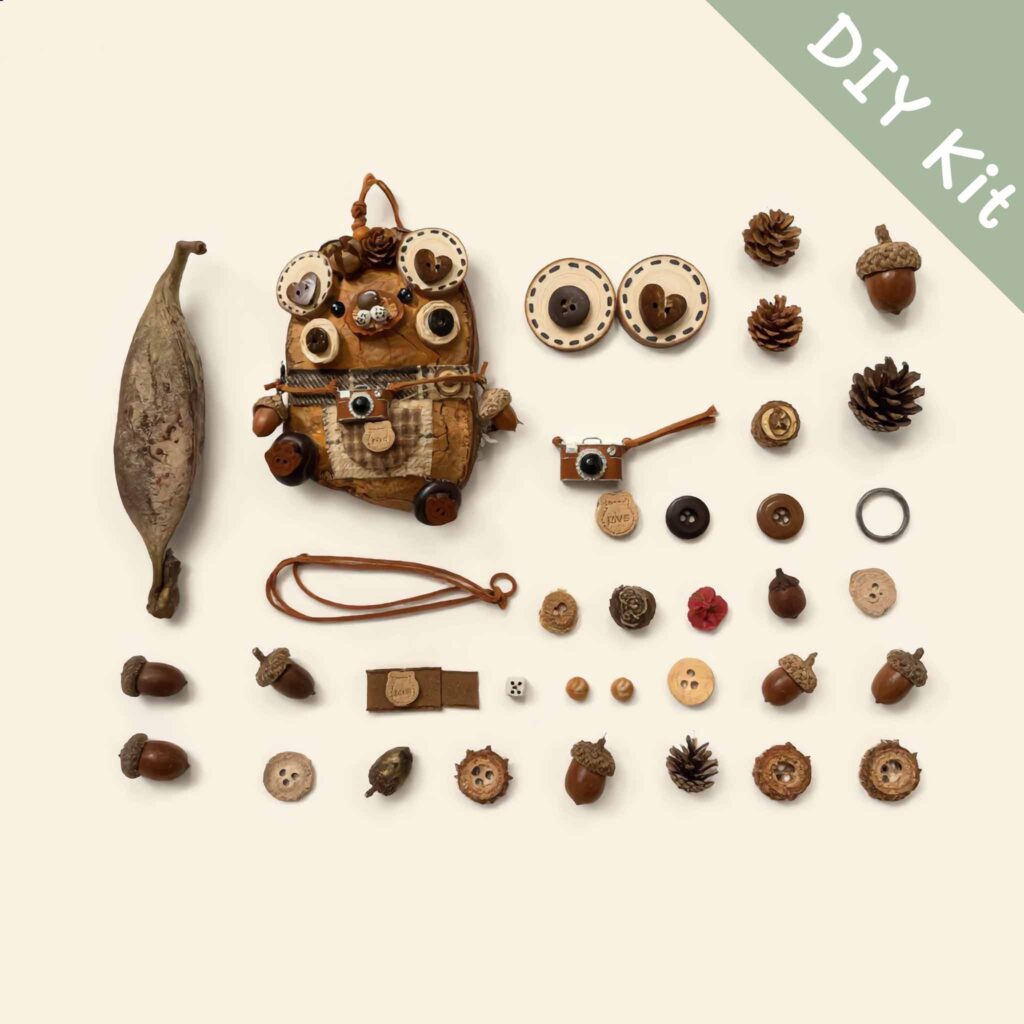 DIY Kit for Pod Doll – Button-Eyed Creature laid out, showing materials