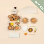 DIY Kit for Brown Dog Pod Doll laid out in a flat-lay arrangement.