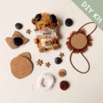 Brown Bear Pod Doll DIY Kit layout showing materials