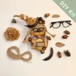 DIY Kit image showing materials laid out for Poddolls Bird with Glasses