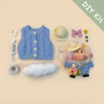 Poddolls DIY Kit laid out with seed pod pieces and accessories