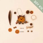 DIY Kit image showing seed pod craft materials for Pod Doll – Deer with Pinecone Crown