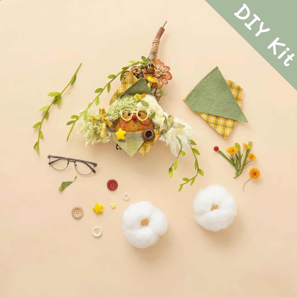 DIY Kit for Newspaper-Textured Clown Pod Doll showing seed pod materials