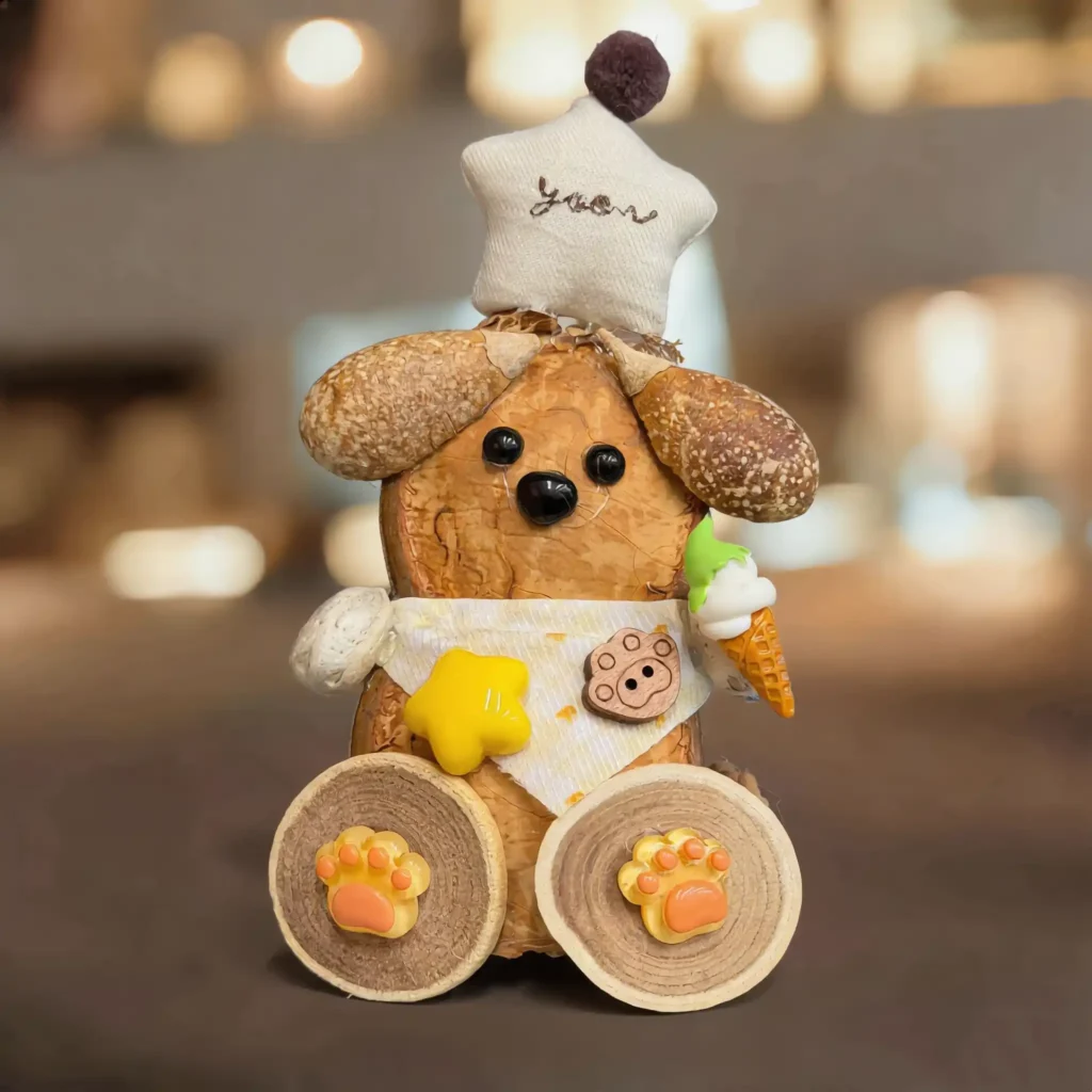 Finished Pod Doll – Brown Dog wearing a knit hat and seed-pod body.