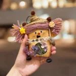 Finished Pod Doll – rosy-cheeked seed-pod face