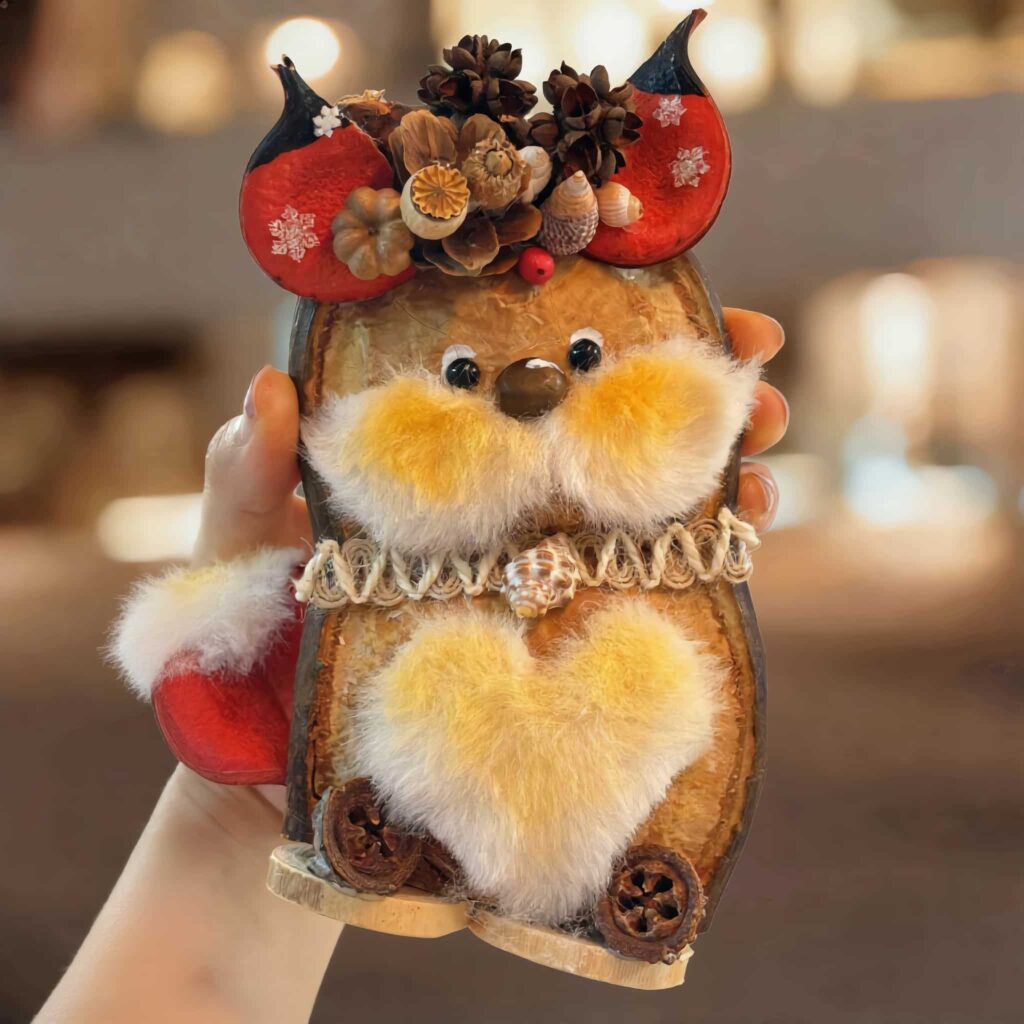 Finished Pod Doll with red seed-pod crown – Poddolls