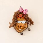 Finished Pod Doll detail image – curly fur and accessories