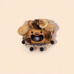 Close-up detail of Open-Mouth Pod Doll – Brown Bear