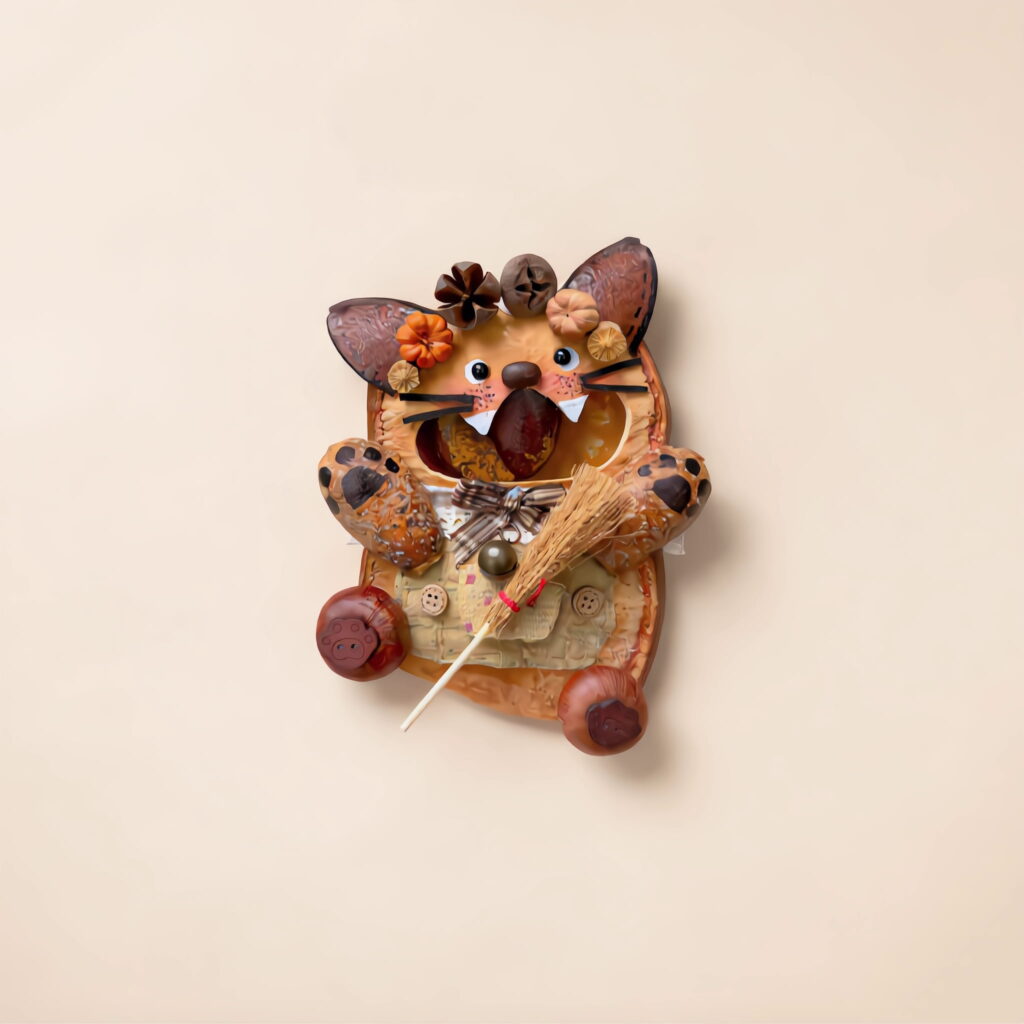Detail shot of the finished Pod Doll – Orange Flower Cat