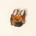 Detail view of Pod Doll – Pumpkin Bunny