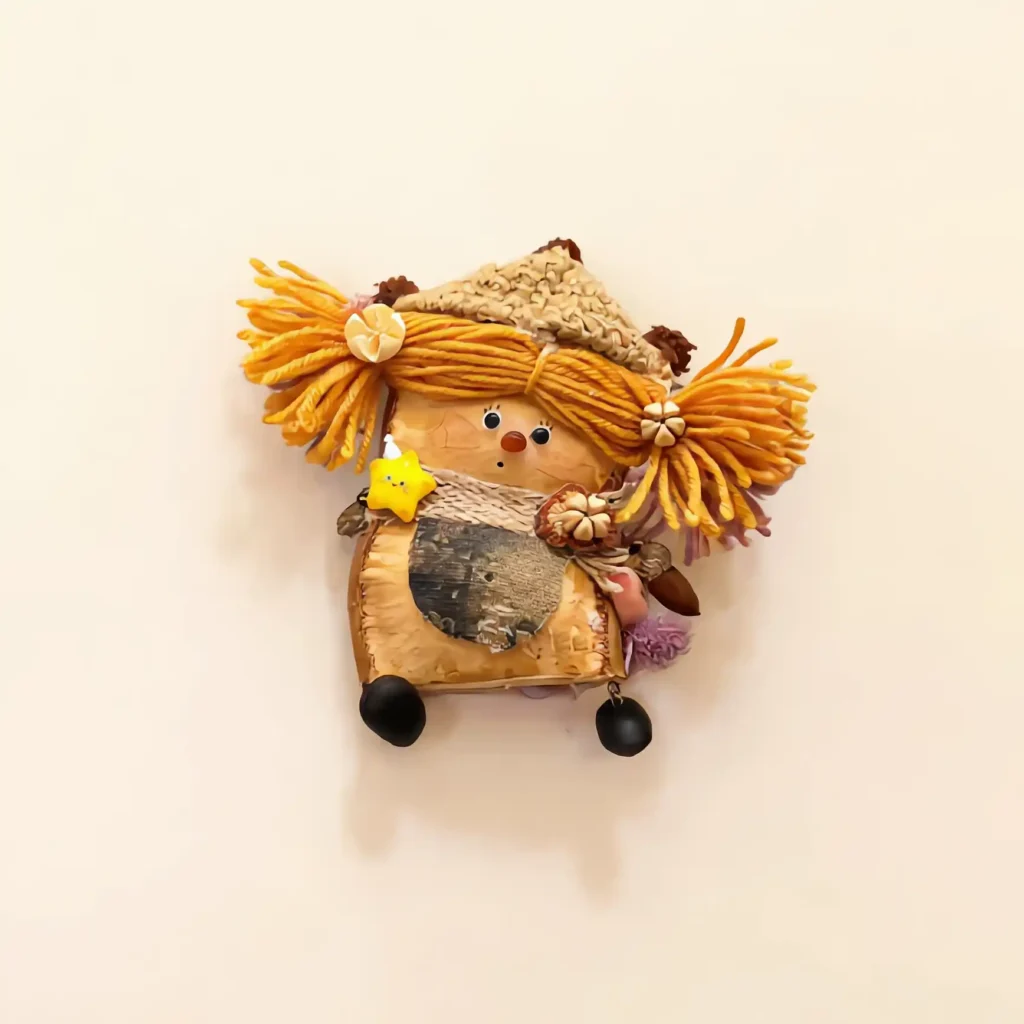 Pod Doll detail image showing face and yarn hair