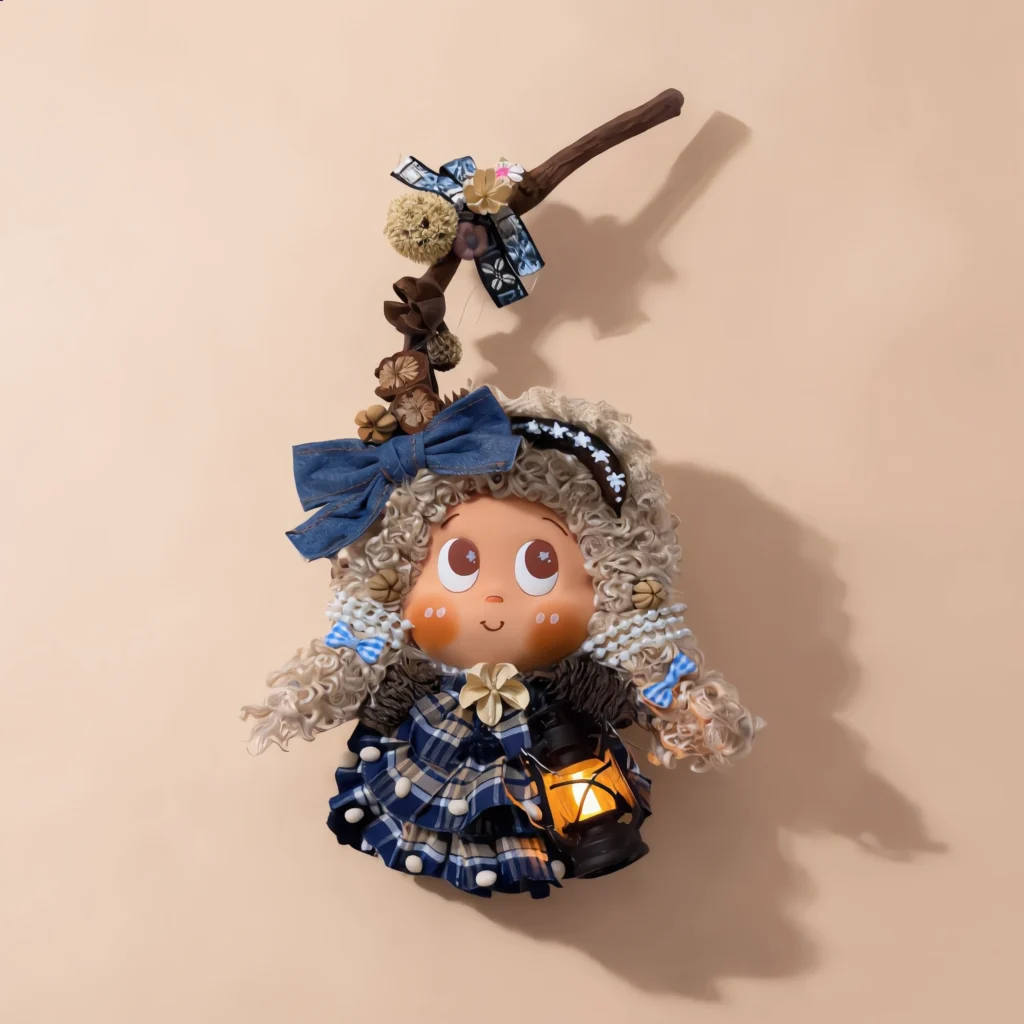 Detail view of the finished Pod Doll's face and seed-pod embellishments
