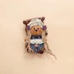 Detail view of the finished Pod Doll Flowered Seed Pod Bear