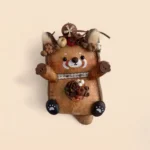 Close-up of Pod Doll Bear detailing seed pod crown and facial features