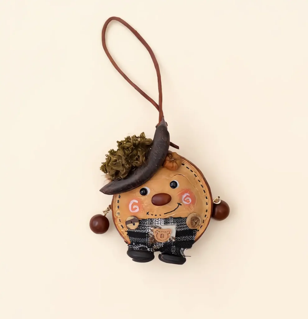 Detail view of Pod Doll Pumpkin-faced