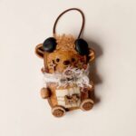 Close-up detail of Brown Bear Pod Doll showing seed-pod texture