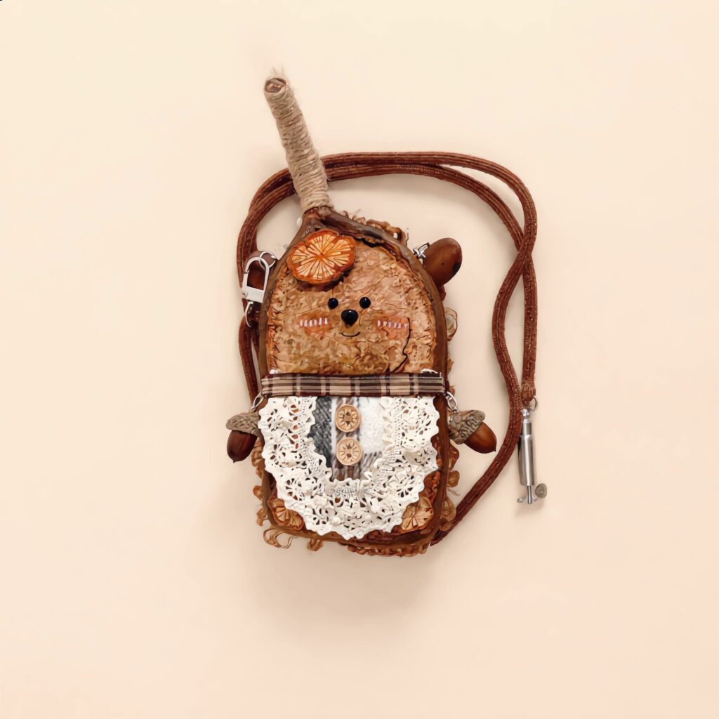 Gallery detail of the finished Pod Doll showing texture and sunburst design
