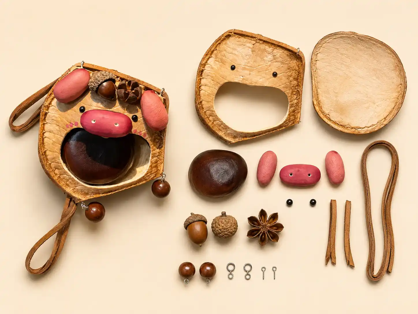 DIY Poddoll kit materials arranged beside a treated natural seed pod shell and finished handmade character