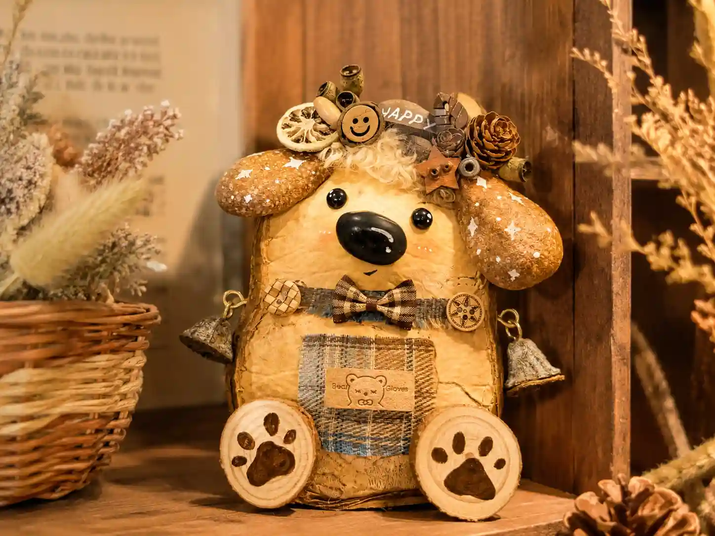 Finished handmade bear pod doll displayed on a wooden shelf with natural textures and cozy handmade decor
