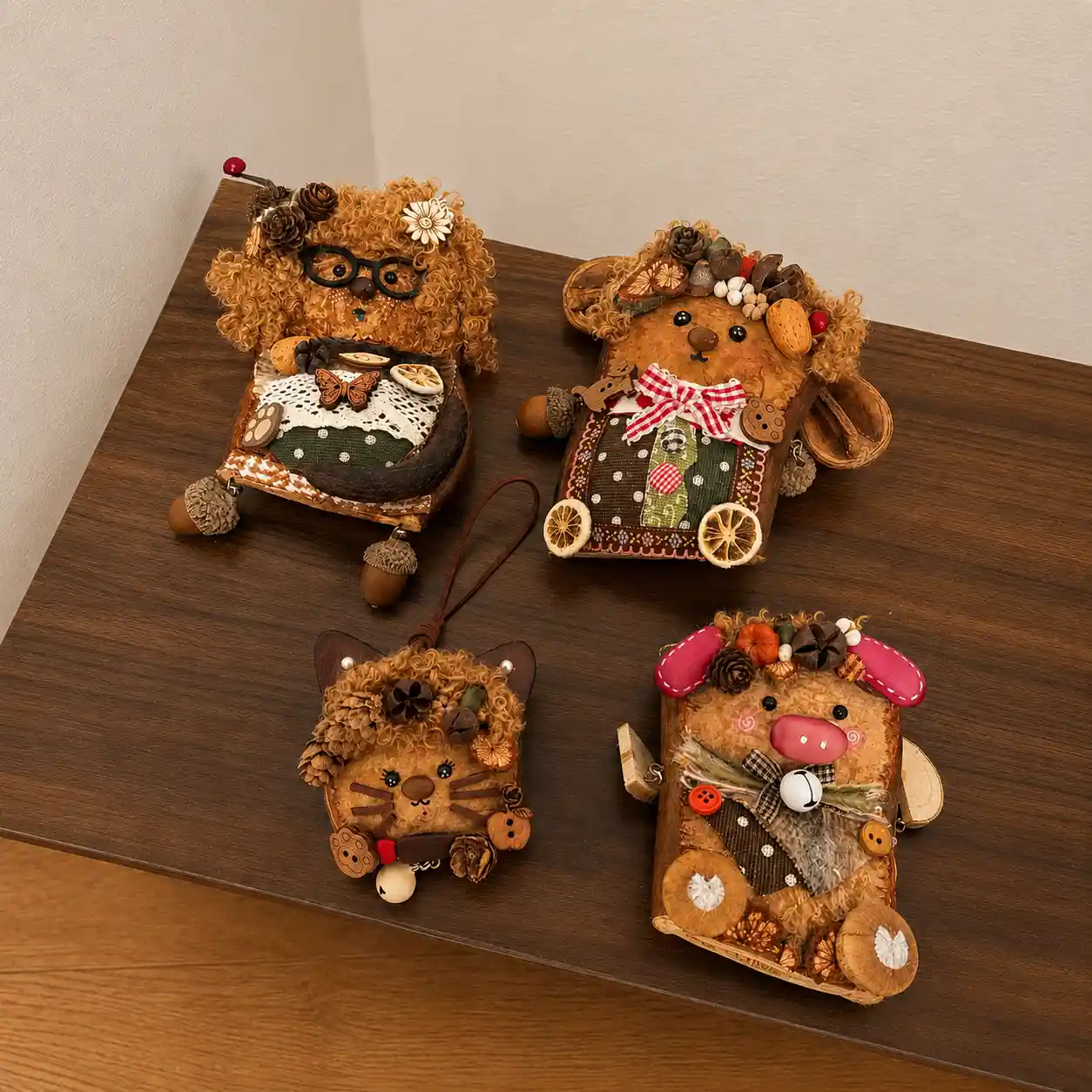 Handmade pod dolls displayed on a dry indoor surface